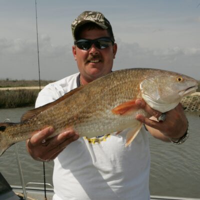 Redfish caught and held up with lure