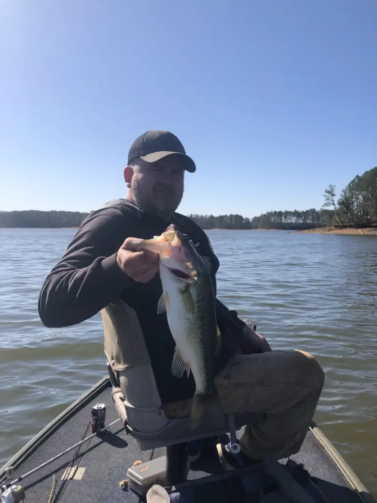 Josh Karr with a Bass from his brother Donny's Bass Boat