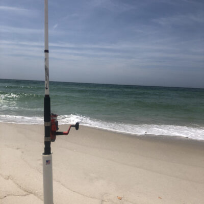 Donny karr surf fishing with his rod in a holder