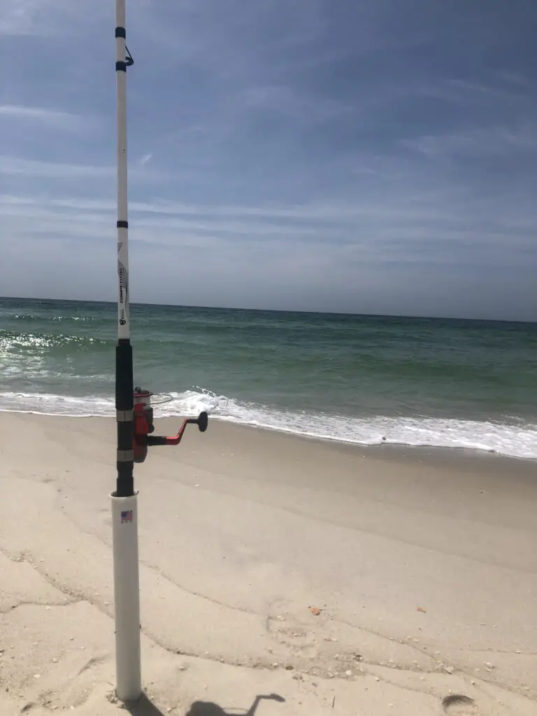 Donny karr surf fishing with his rod in a holder