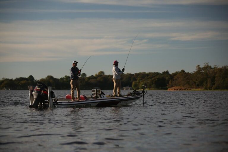 two men fishing from a bass boat