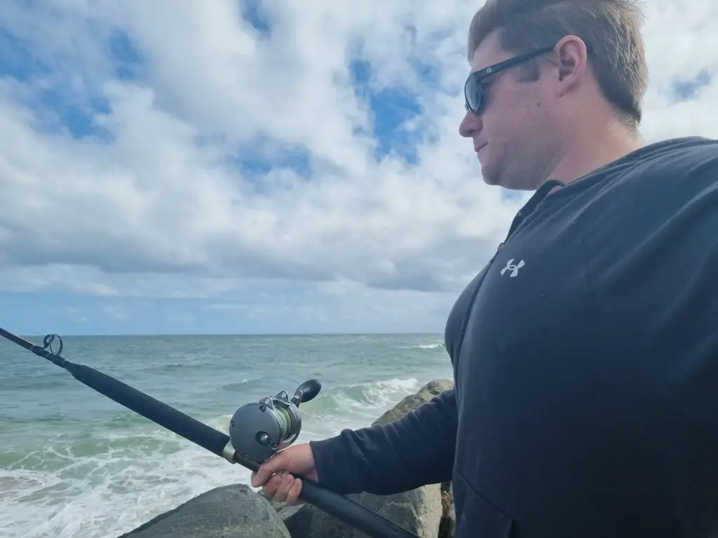 Russ Egan testing a Shimano Tyrnos fishing in the ocean from the shore
