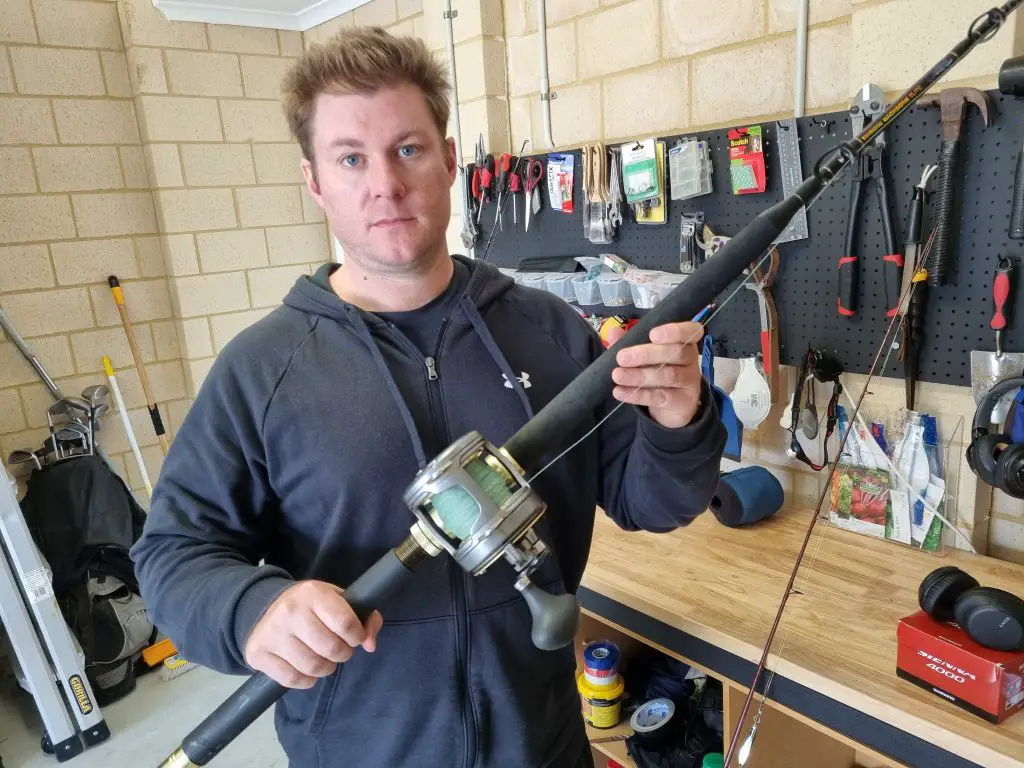 Russ Egan bench testing a Shimano Tyrnos 20 away from the water with a heavy boat overhead rod