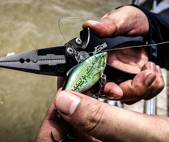 Using the Booms Fishing Pliers to Cut a Line to a Fishing Lure