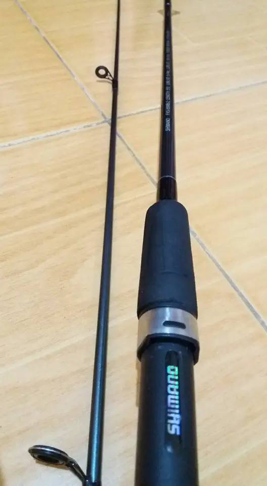 close up of shimano fx spinning rod gudie and reel seat