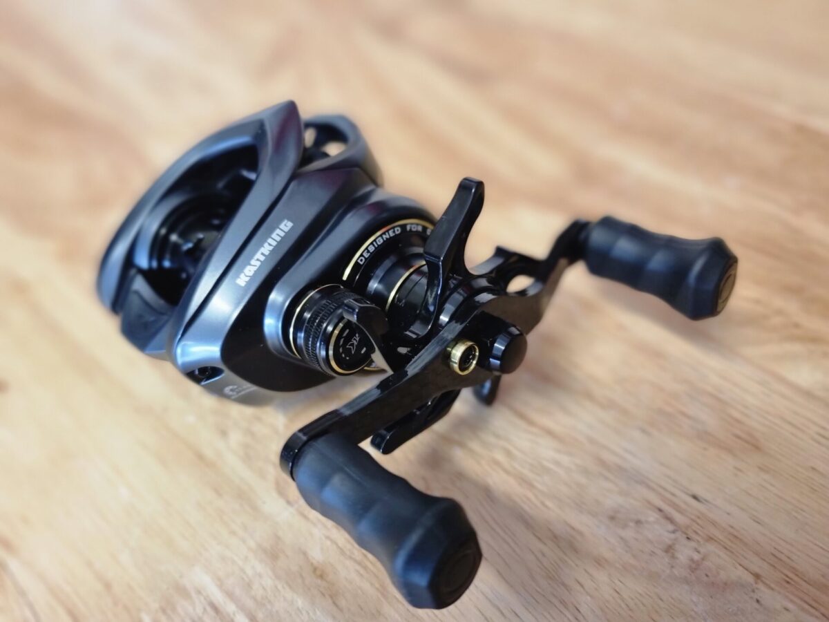 Kastking kestrel elite focusing on the handle, star drag, and spool tension knob