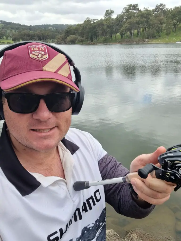 Russ Egan holding a KastKing Kestrel BFS and Assegai rod during field testing